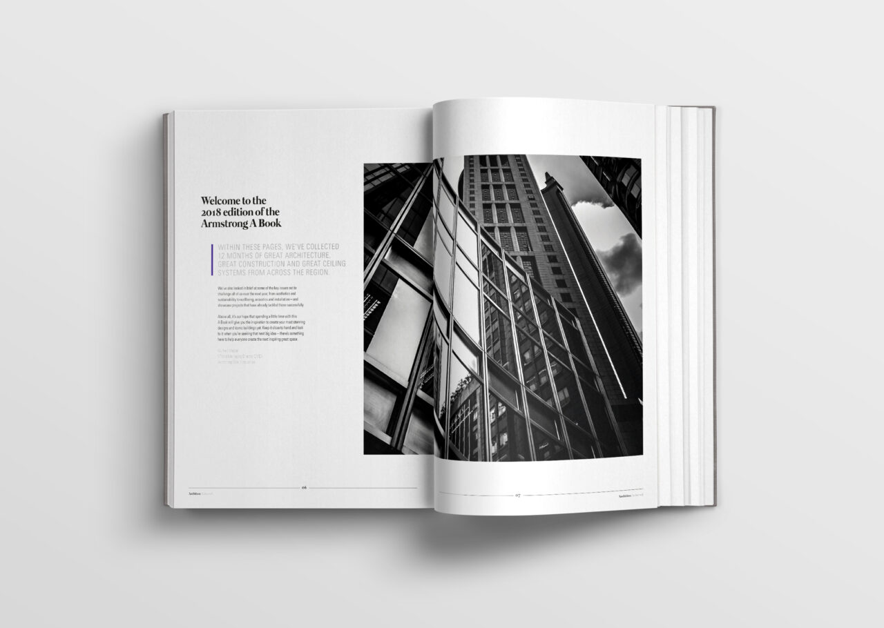 A black and white image of a brand story book detailing Armstrong roofing