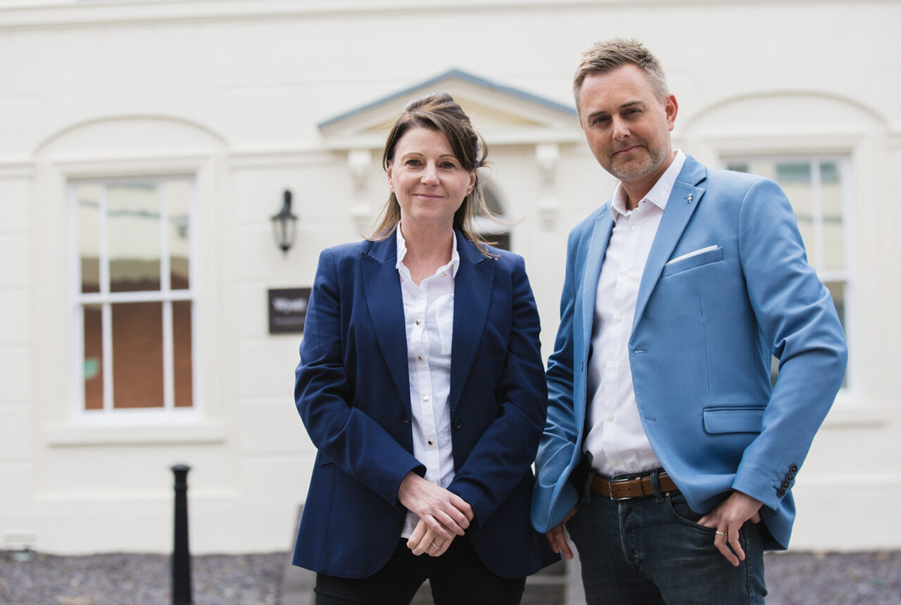 Karen Bernie, CEO of Wyatt international and Mark Fones the Managing Director, standing in front of Wyatt headquarters