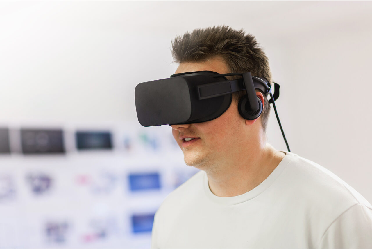 Adam Sidaway wearing a VR headset