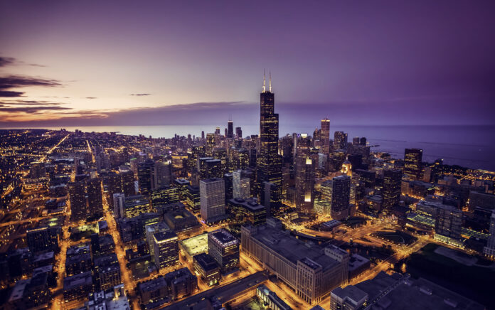 A wide landscape shot of a city at night