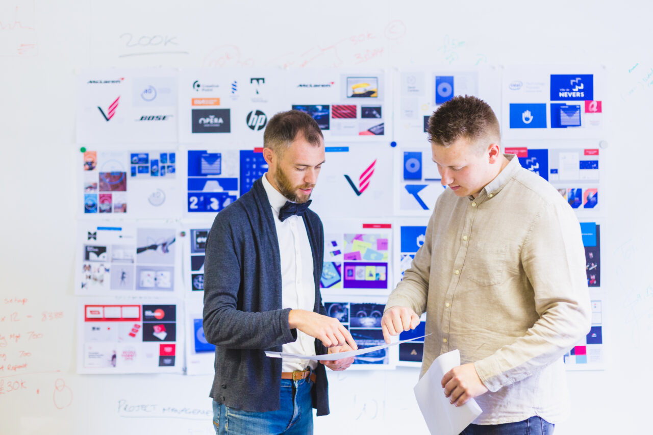 Simon Hall, Brand and Strategy Director, and Adam Sidaway, Senior Designer, discussing creative concepts.