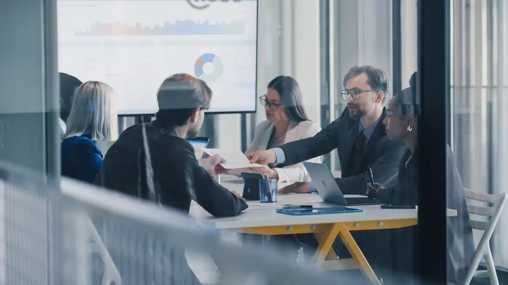 People in office collaborating and discussing